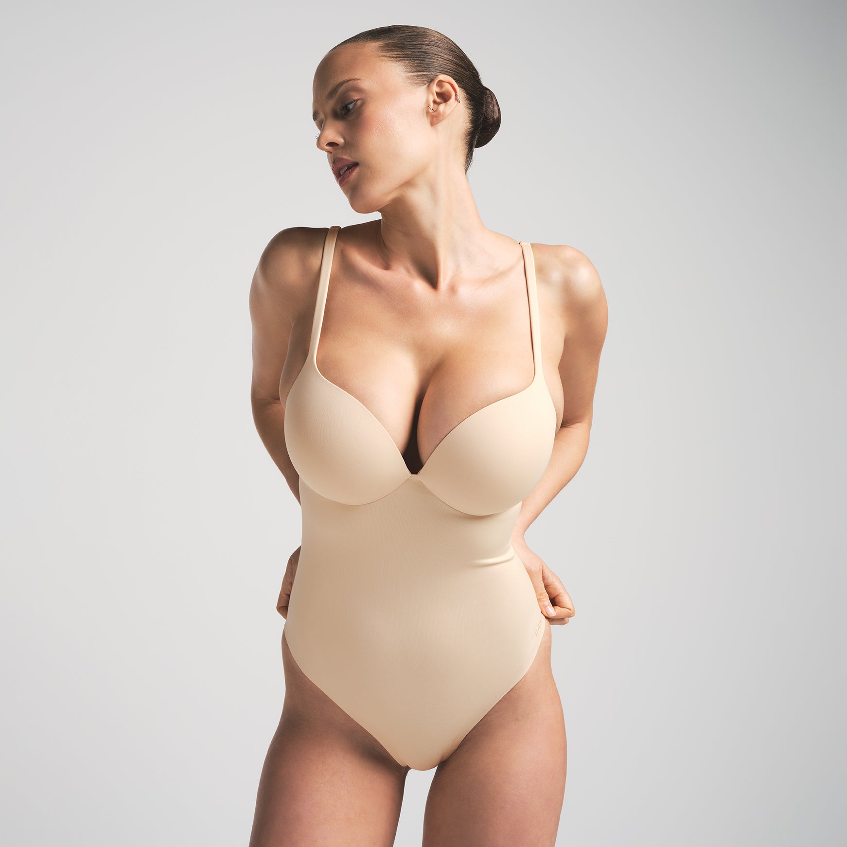 SKIMS ULTIMATE BODY PUSH-UP THONG BODYSUIT | SAND - Image 2